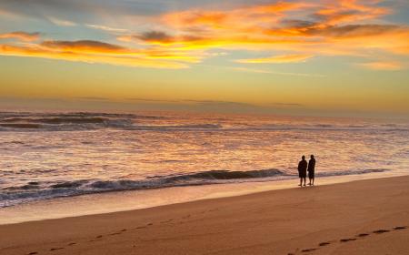 Romantic Walk on the Beach with Ocean Sunset